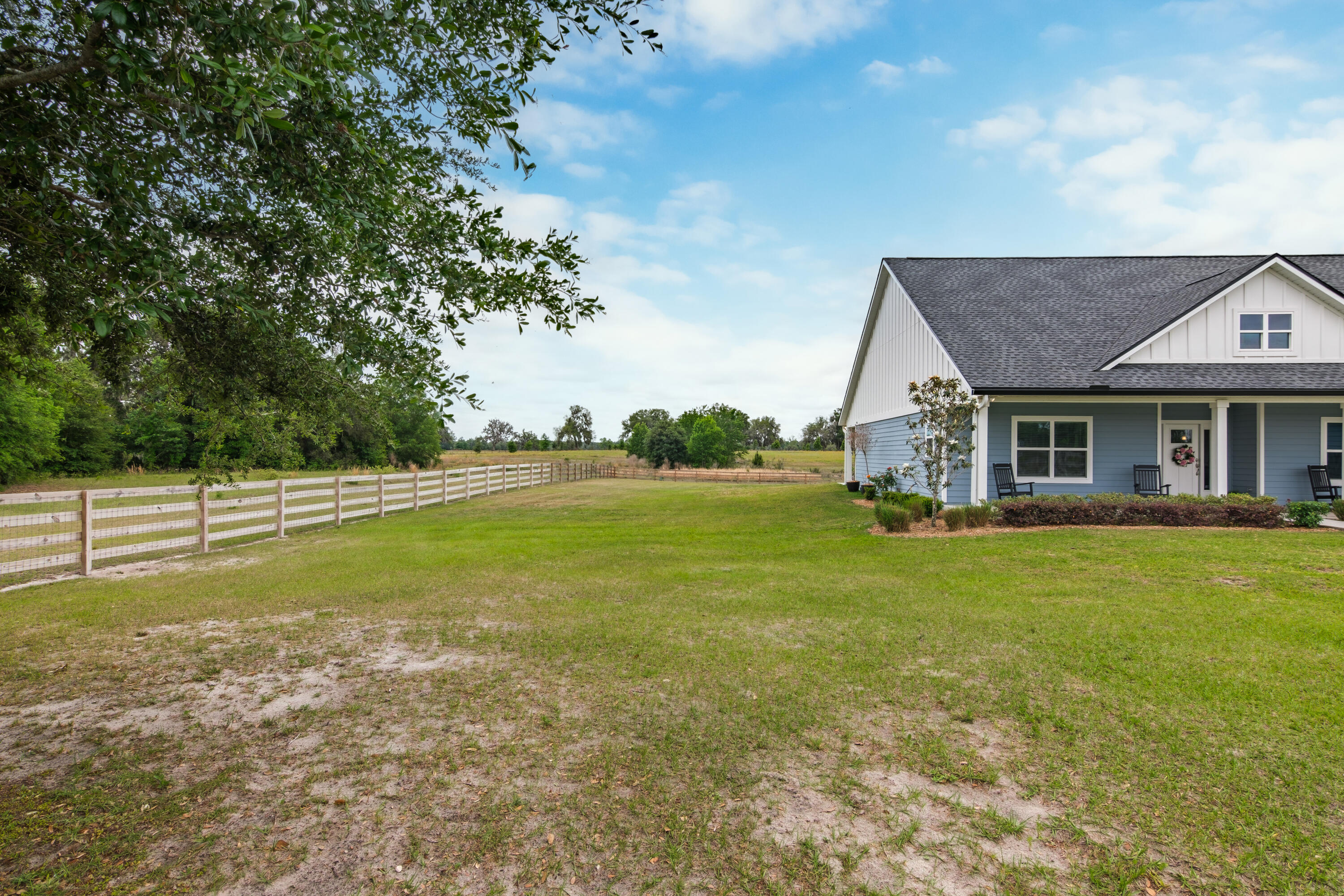 10172 98th Street, Unit 2 Live Oak, FL 32060 - Photo 11 of 37 a view of a house with a backyard