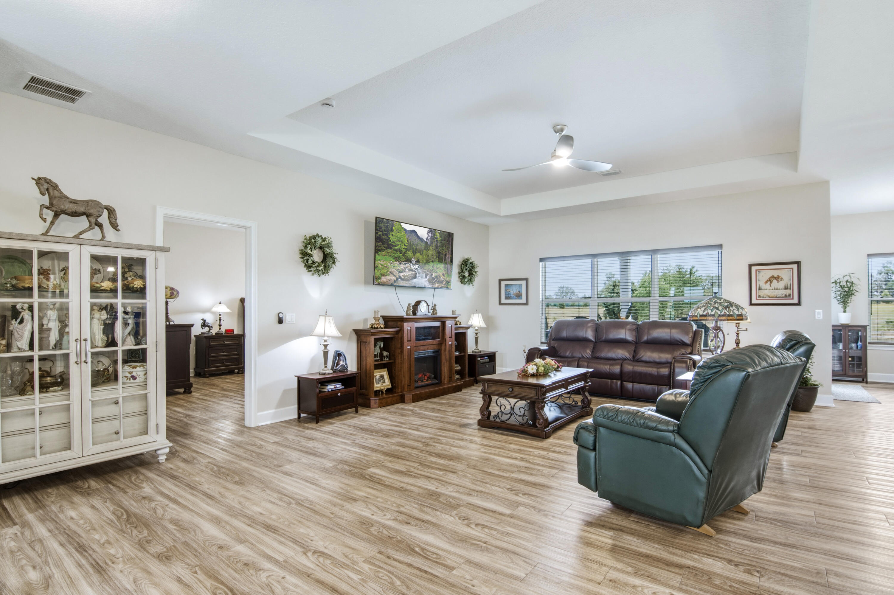 10172 98th Street, Unit 2 Live Oak, FL 32060 - Photo 14 of 37 a living room with furniture and wooden floor