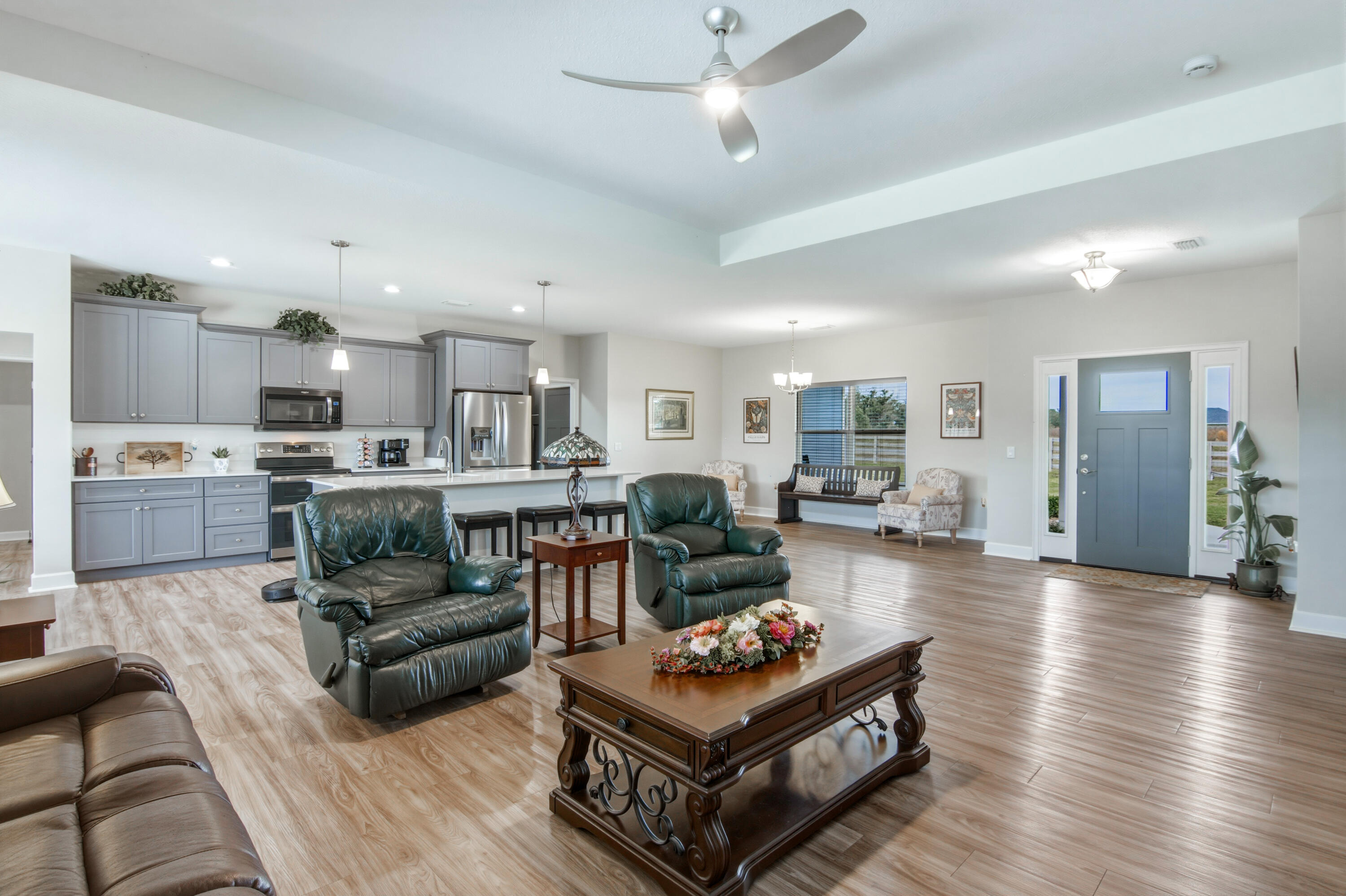 10172 98th Street, Unit 2 Live Oak, FL 32060 - Photo 15 of 37 a living room with furniture and kitchen view
