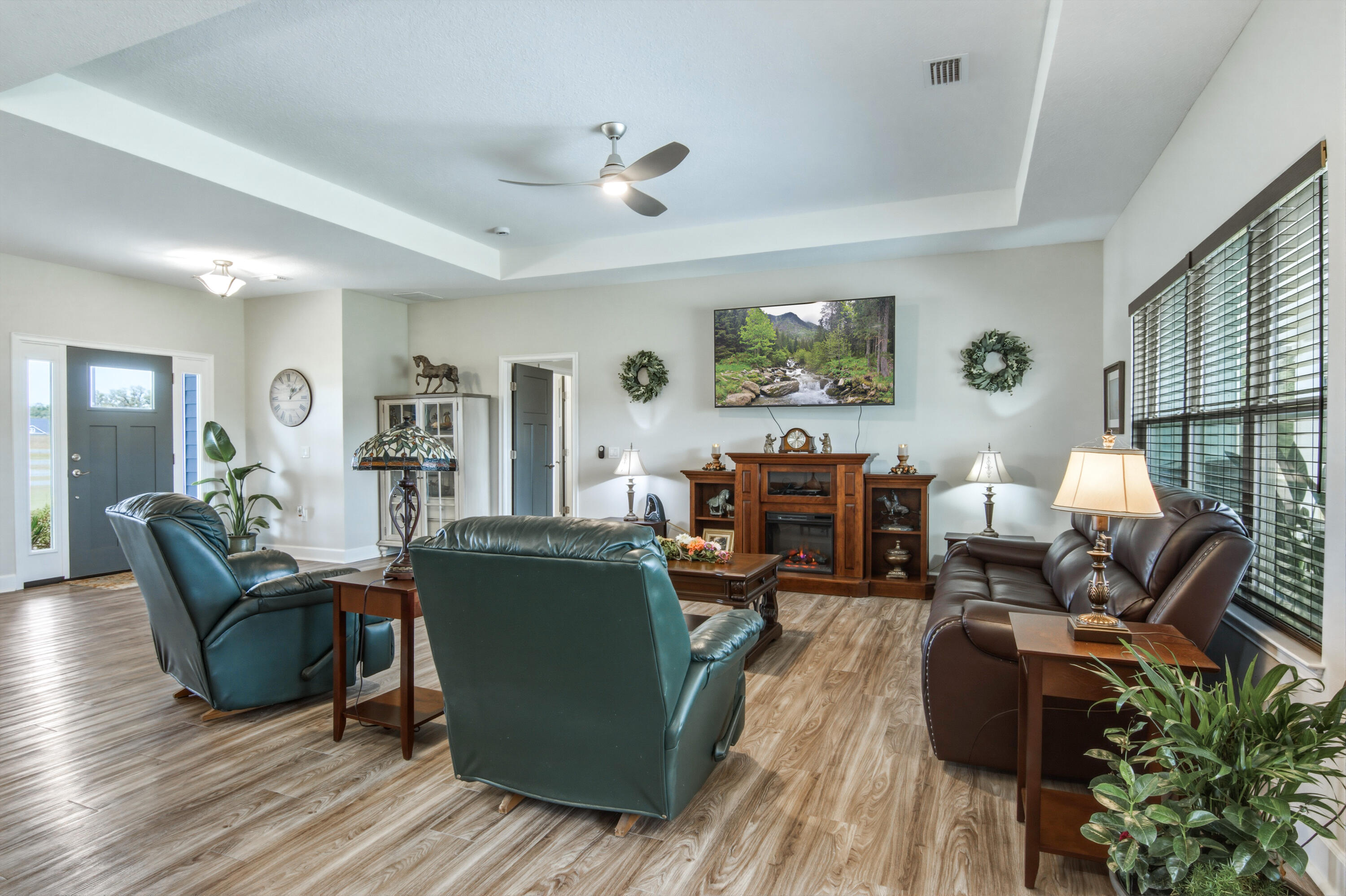 10172 98th Street, Unit 2 Live Oak, FL 32060 - Photo 22 of 37 a living room with furniture window and wooden floor