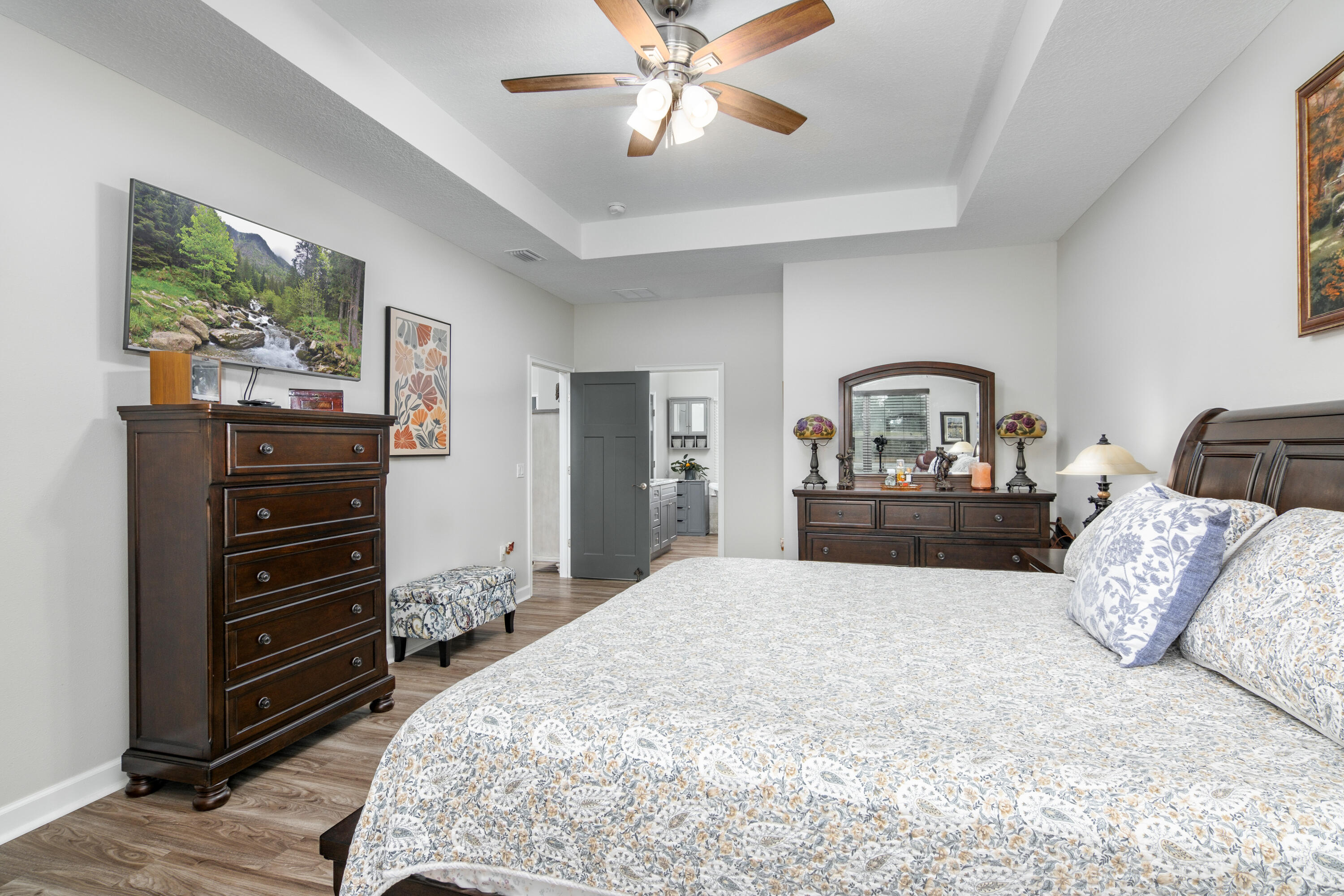 10172 98th Street, Unit 2 Live Oak, FL 32060 - Photo 23 of 37 a bedroom with a bed and furniture