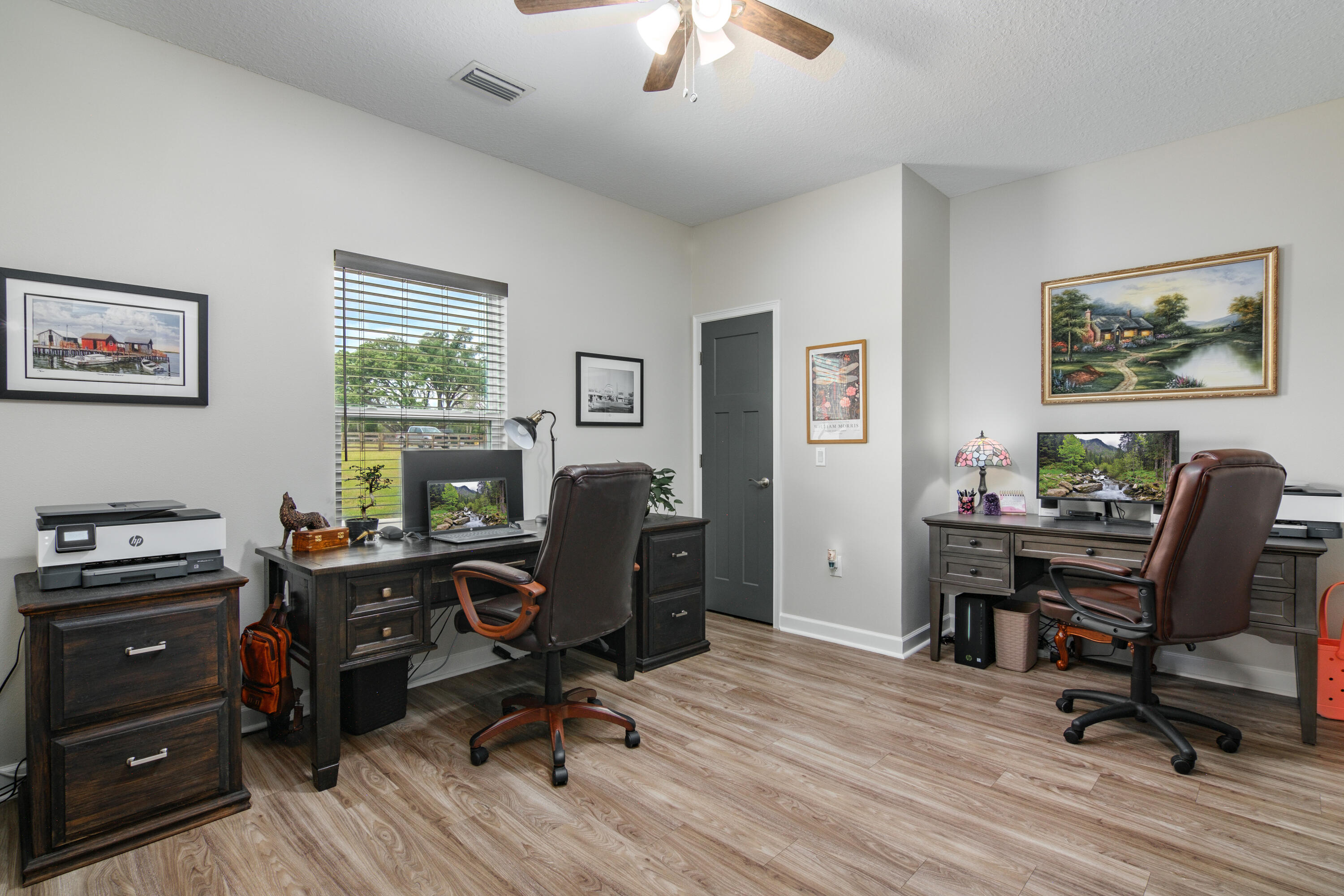 10172 98th Street, Unit 2 Live Oak, FL 32060 - Photo 33 of 37 a view of a workspace with furniture and a window