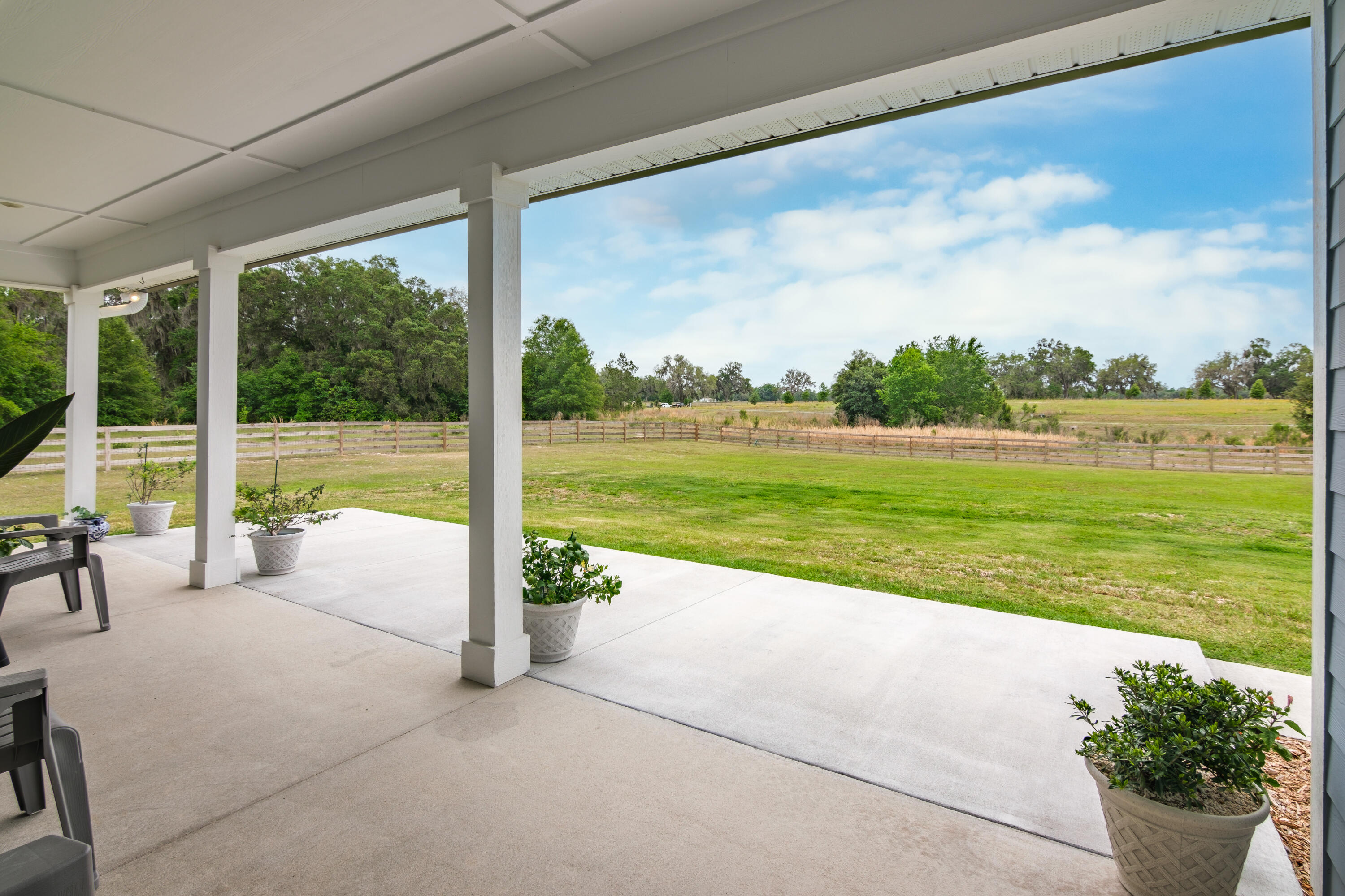 10172 98th Street, Unit 2 Live Oak, FL 32060 - Photo 37 of 37 a view of a patio with a yard