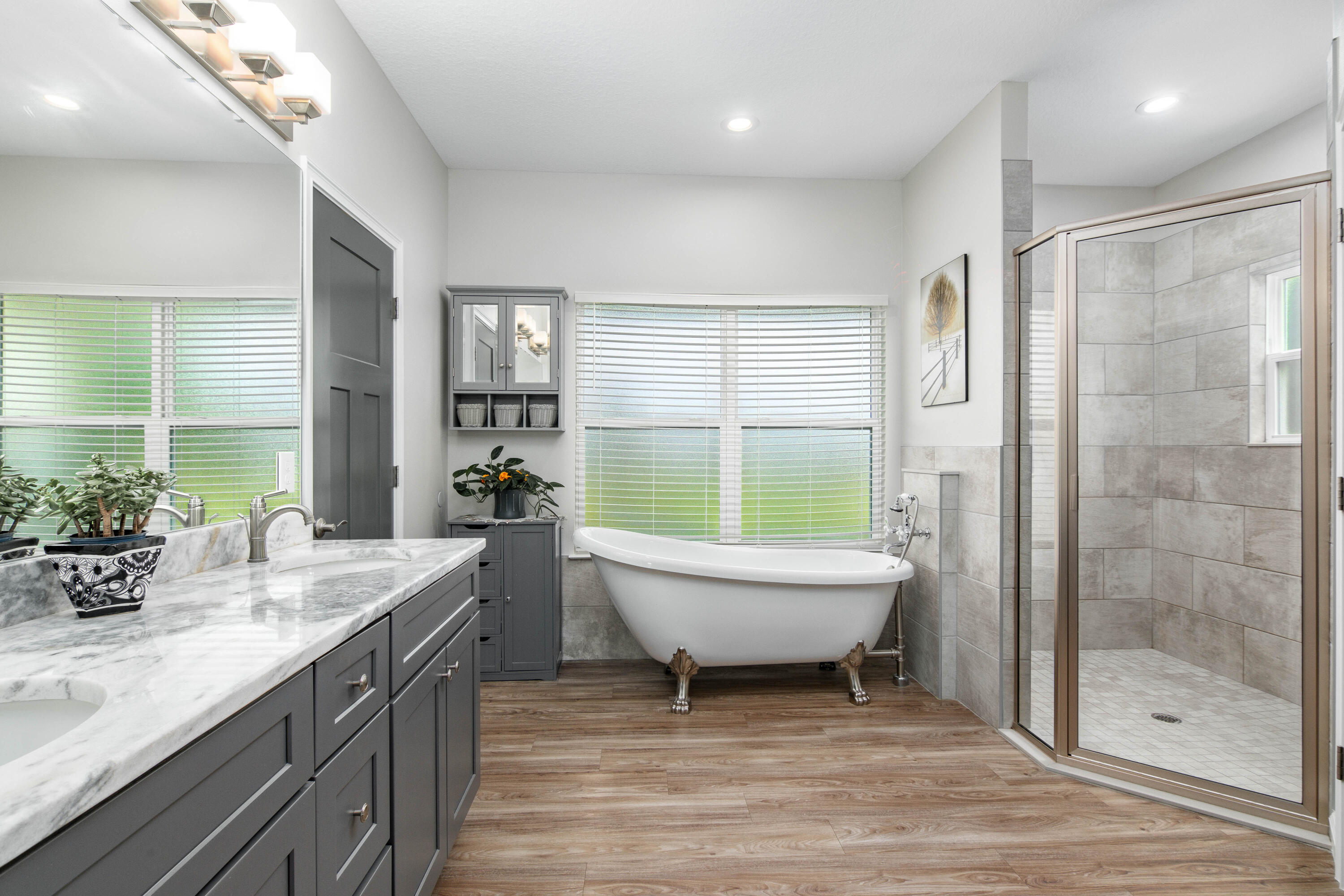 10172 98th Street, Unit 2 Live Oak, FL 32060 - Photo 7 of 37 a bathroom with a double vanity sink toilet and shower