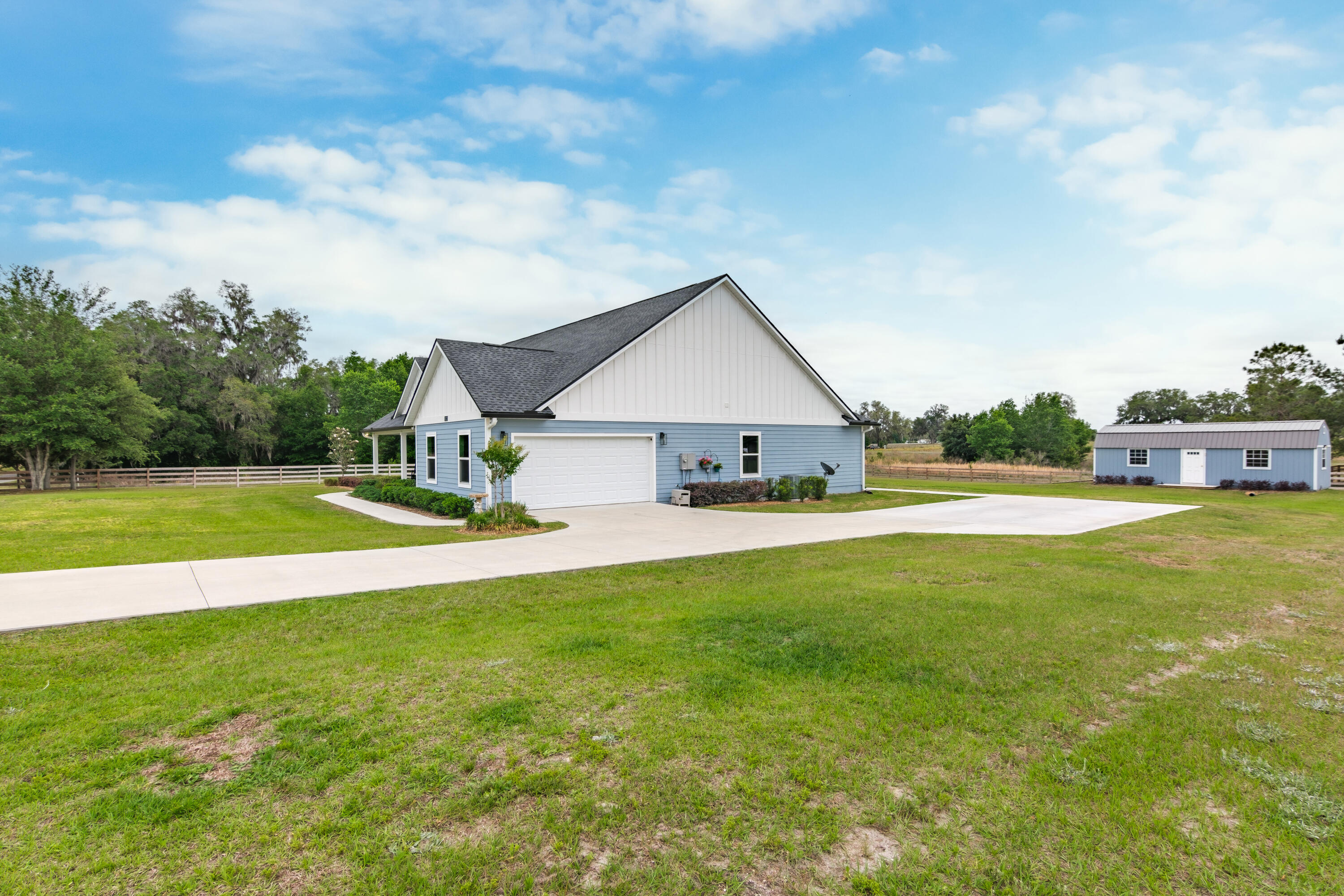 10172 98th Street, Unit 2 Live Oak, FL 32060 - Photo 8 of 37 a view of a house with a big yard