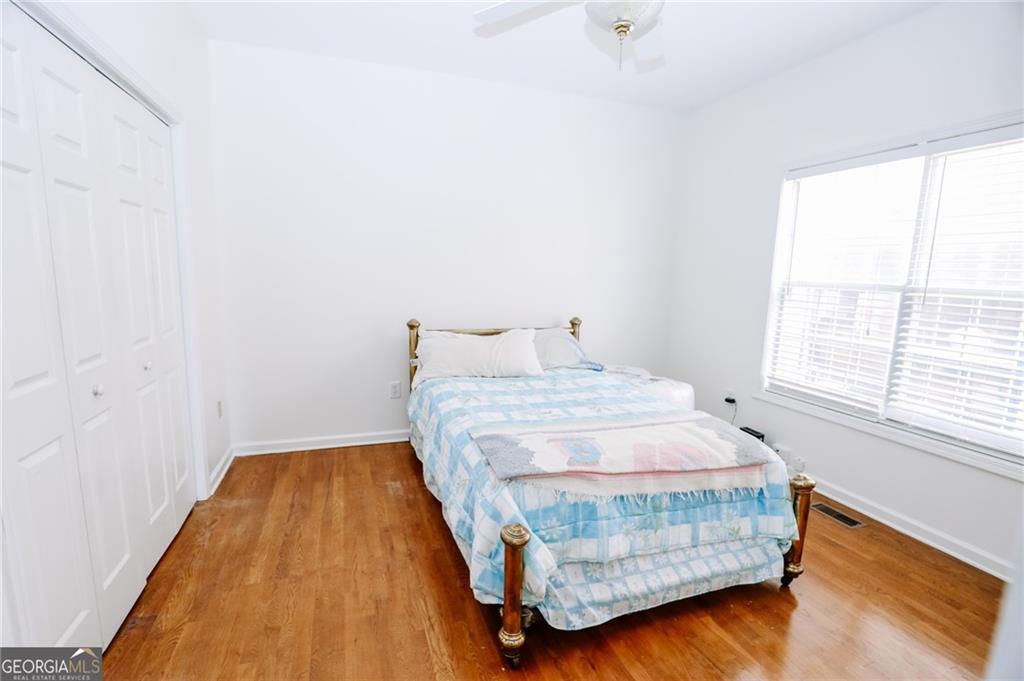 7404 Golfers Villa Rica, GA 30180 - Photo 23 of 43 a bedroom with a bed and window