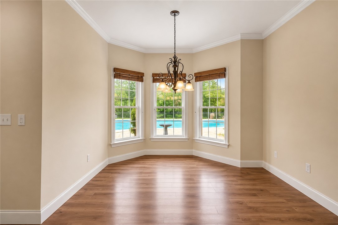 114 Willowbend Drive Anderson, SC 29621 - Photo 40 of 50 This bright space features a striking bay window, offering serene views of the outdoor pool.