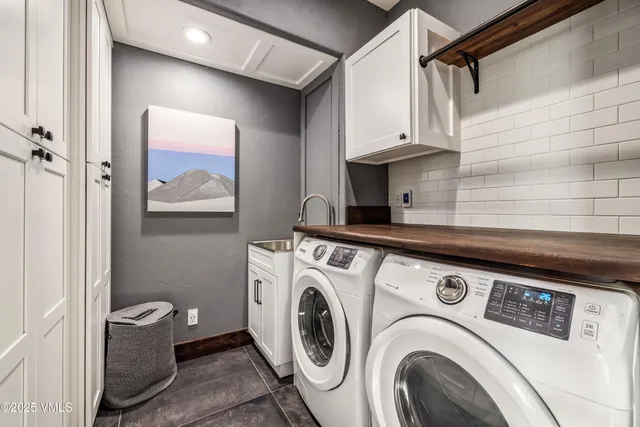a utility room with dryer and washer