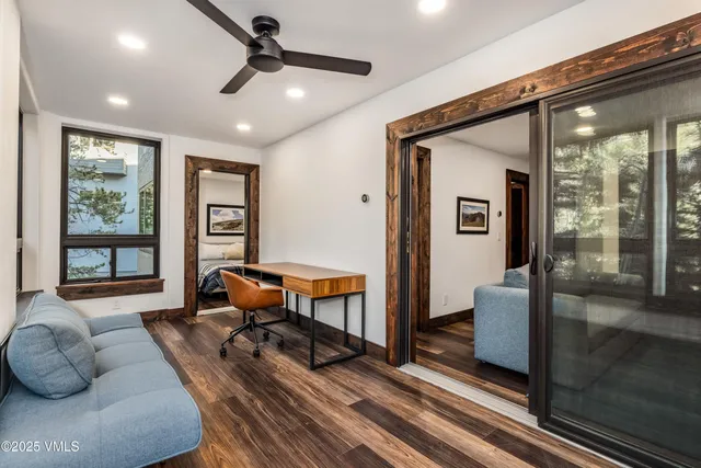 a bedroom with furniture and a window