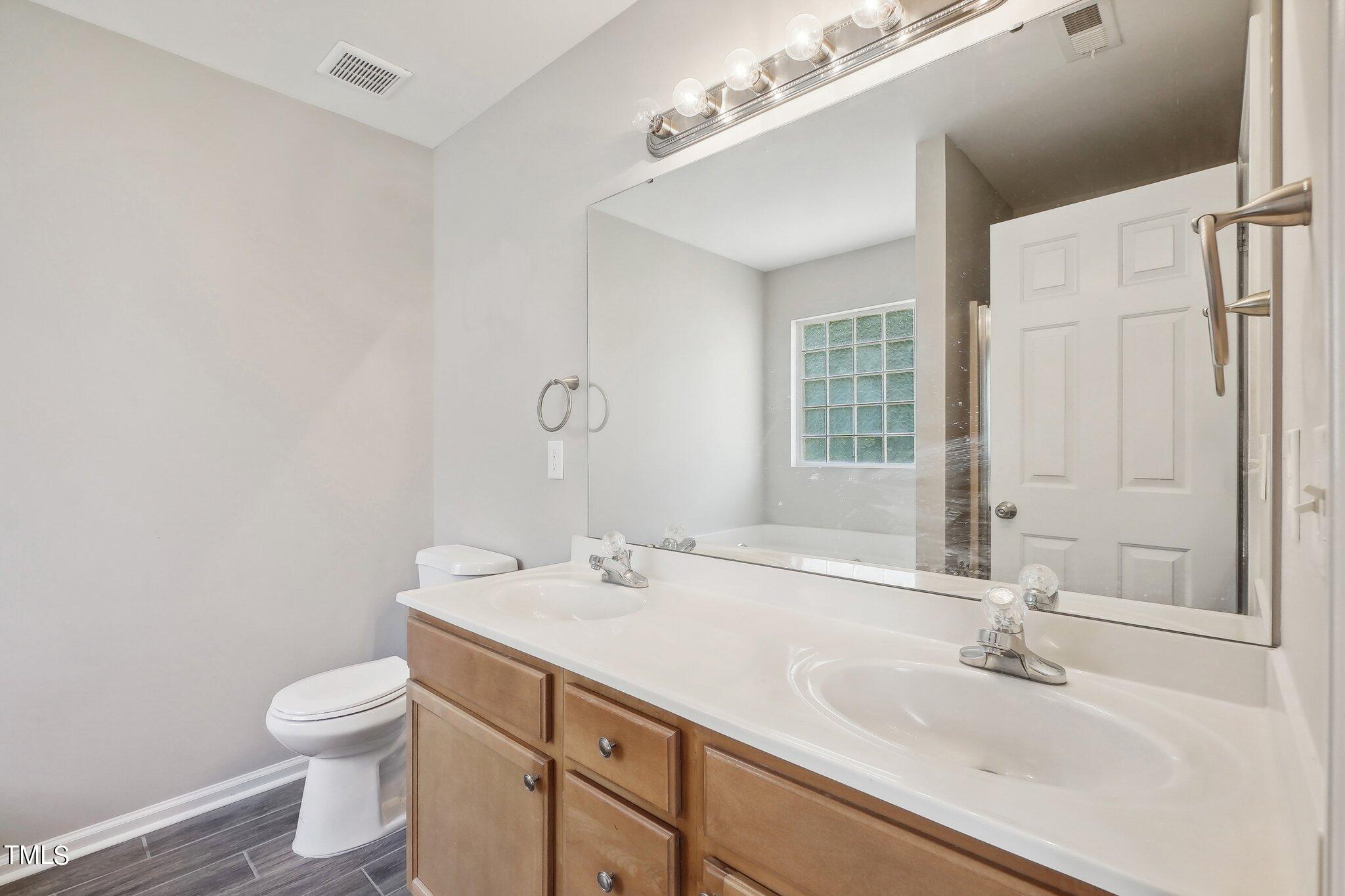 7005 Missionary Ridge Drive Raleigh, NC 27610 - Photo 18 of 27 19Primary Bathroom