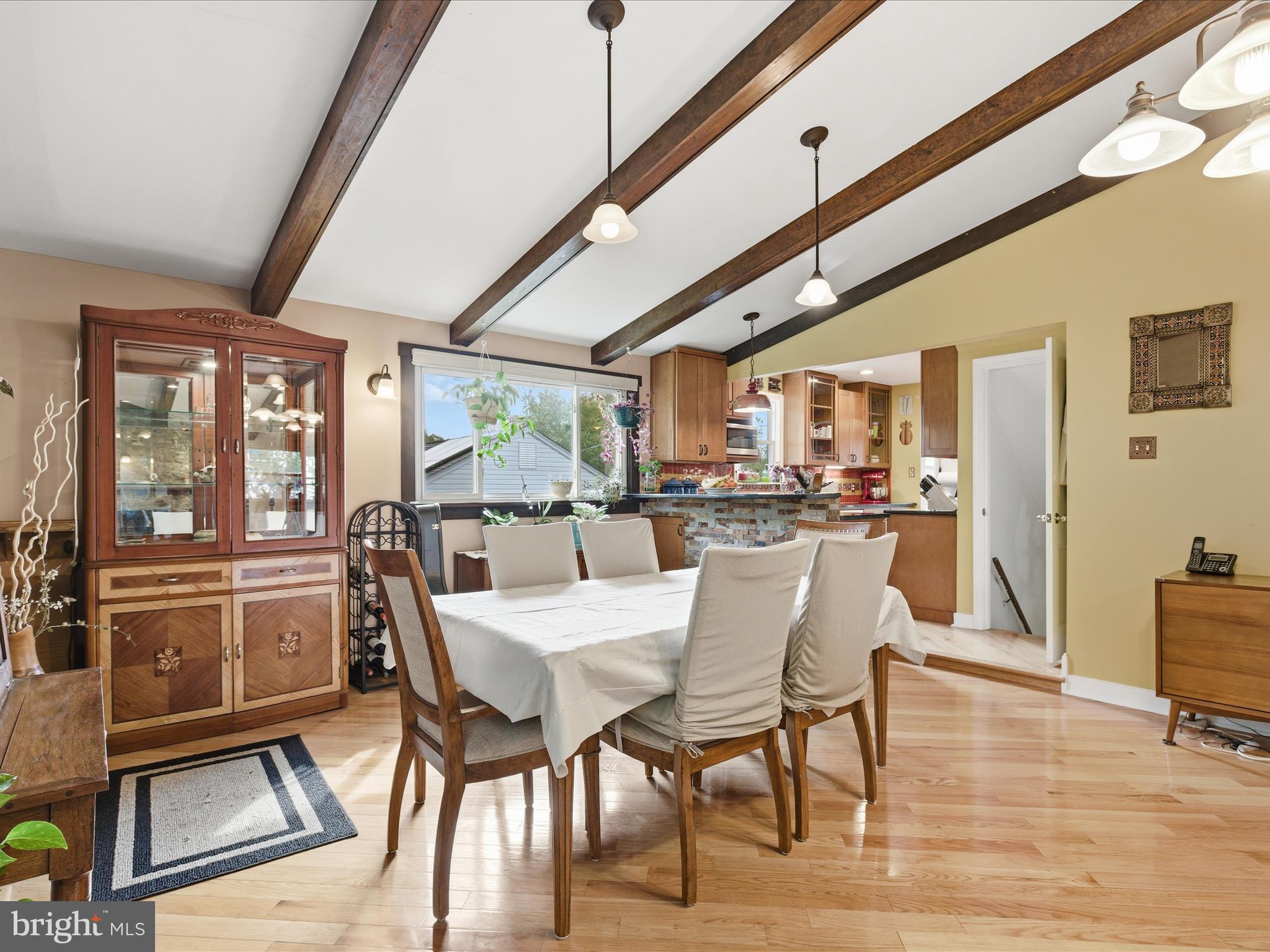 2707 Lindell Street Silver Spring, MD 20902 - Photo 15 of 51 a view of a dining room with furniture window and wooden floor
