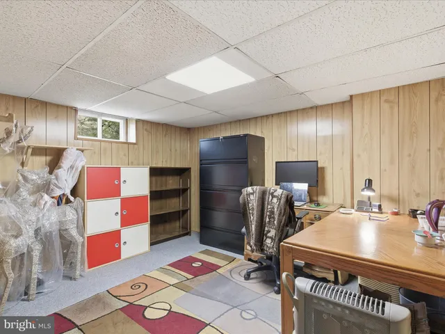 a kitchen that has a refrigerator and a sink