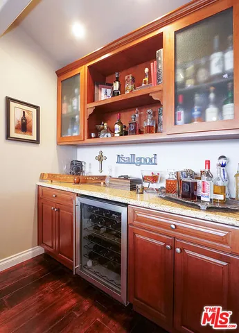 a kitchen with stainless steel appliances granite countertop a stove and a sink