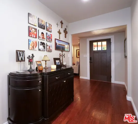 a room with furniture and wooden floor