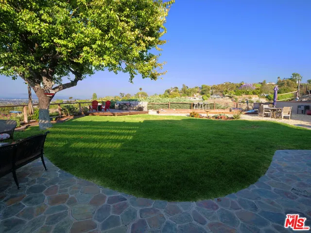 a view of a golf course with a garden