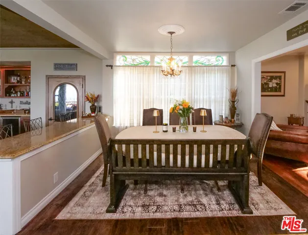 a view of a dining room with furniture