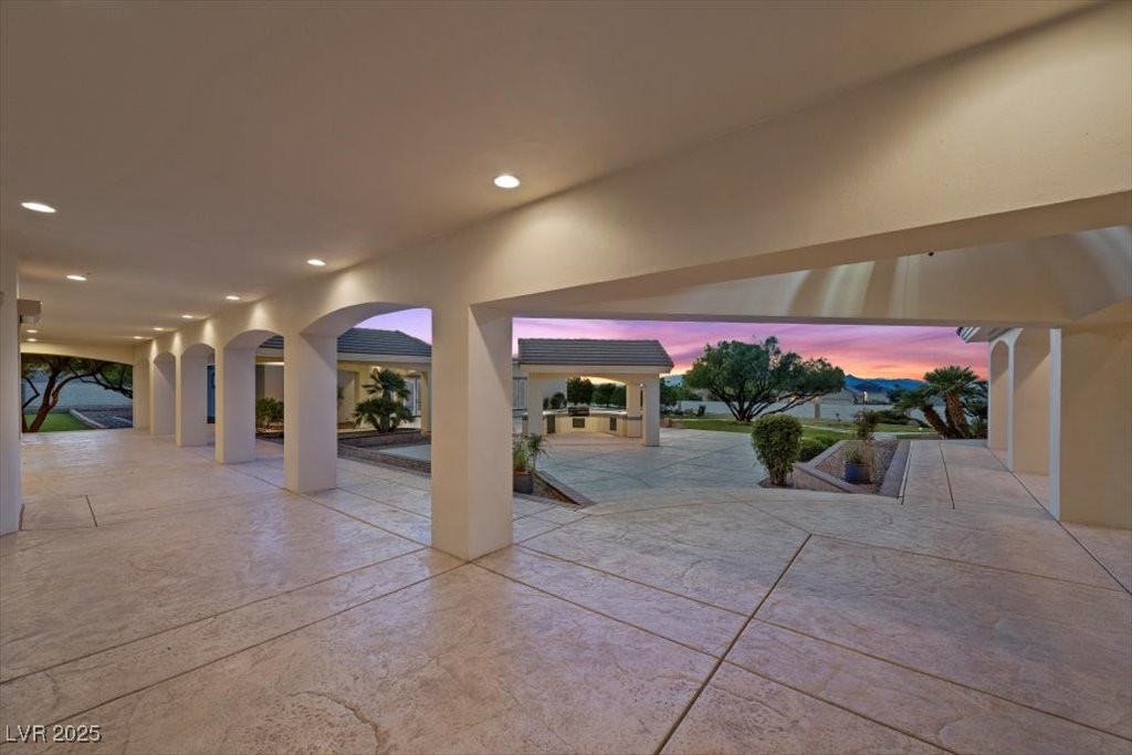 640 Quail Covey Road Henderson, NV 89002 - Photo 66 of 75 View of patio from kitchen door at dusk