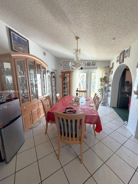 13041 Southwest 260th Terrace Homestead, FL 33032 - Photo 39 of 46 a view of a dining room with furniture window and wooden floor
