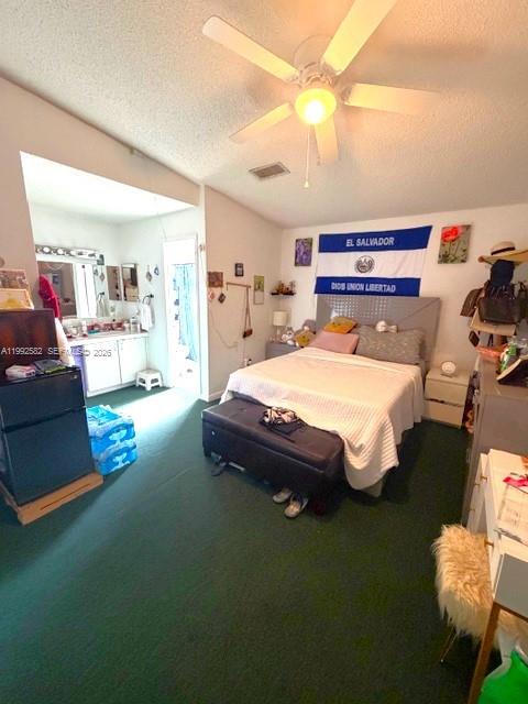 13041 Southwest 260th Terrace Homestead, FL 33032 - Photo 41 of 46 a bed room with a bed and a couch
