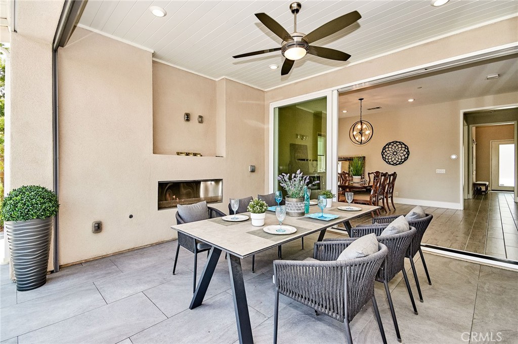 115 Crossover Irvine, CA 92618 - Photo 22 of 64 a view of a livingroom with furniture and a potted plant