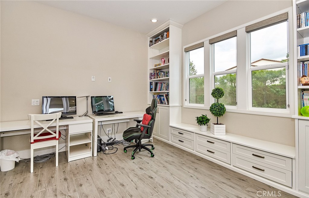 115 Crossover Irvine, CA 92618 - Photo 26 of 64 a workspace with furniture and a window