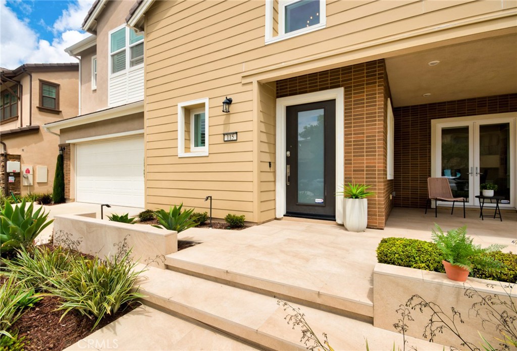 115 Crossover Irvine, CA 92618 - Photo 4 of 64 a view of a entryway front of house