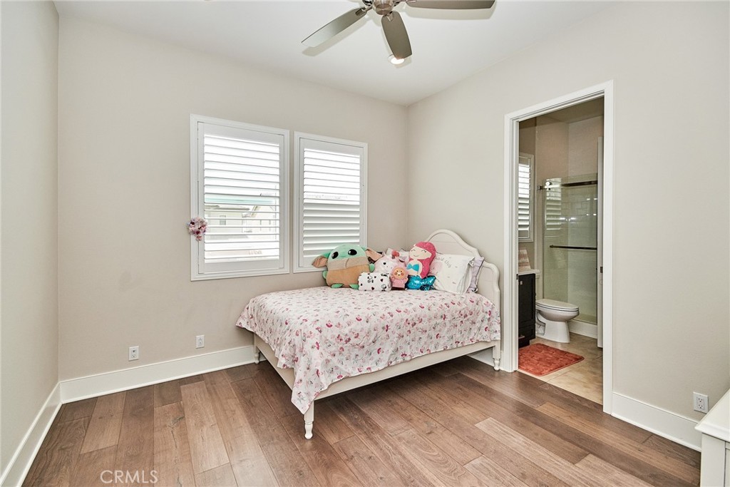 115 Crossover Irvine, CA 92618 - Photo 48 of 64 a bedroom with a bed and window