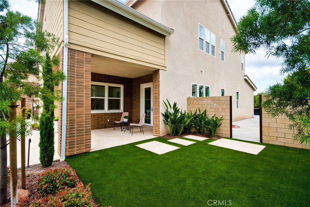 115 Crossover Irvine, CA 92618 - Photo 5 of 64 a view of an house with backyard space and garden