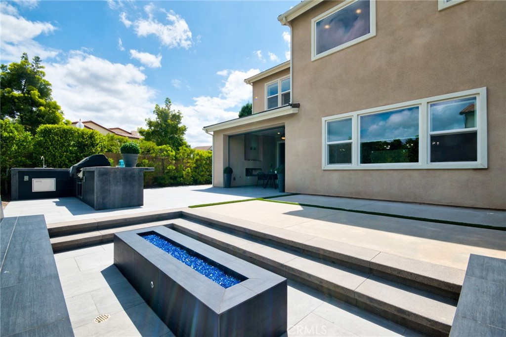 115 Crossover Irvine, CA 92618 - Photo 57 of 64 a view of house with backyard and seating space