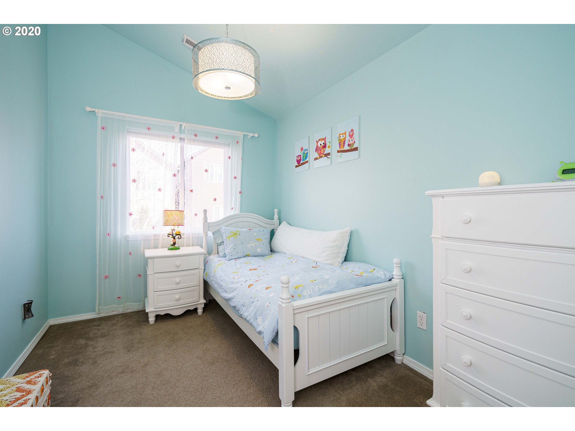 5843 Southeast 16th Loop Gresham, OR 97080 - Photo 21 of 30 a bed room with a bed and a window