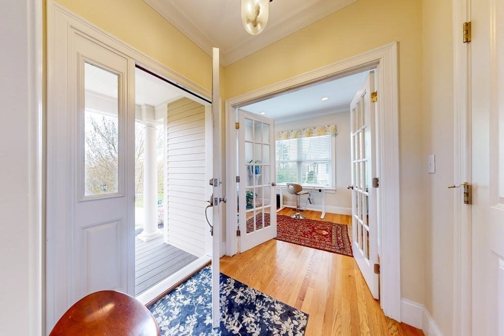31 Sunset Ridge Lane, Unit 31 Bolton, MA 01740 - Photo 1 of 25 a large living room with a large window