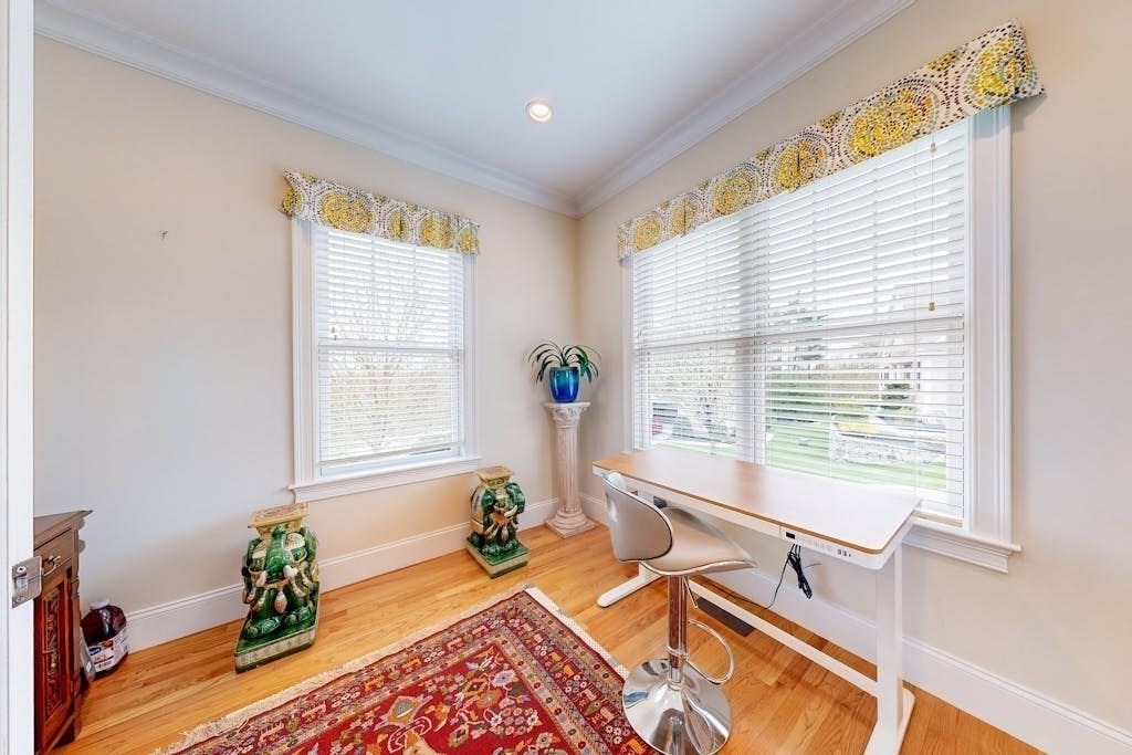31 Sunset Ridge Lane, Unit 31 Bolton, MA 01740 - Photo 2 of 25 a living room with furniture and a window