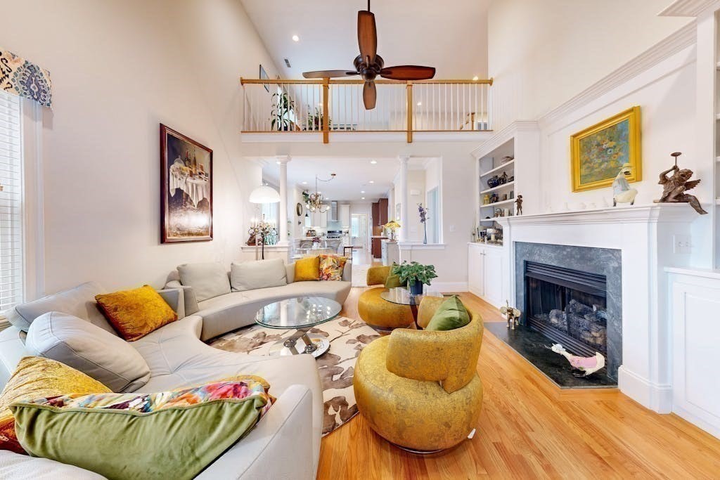 31 Sunset Ridge Lane, Unit 31 Bolton, MA 01740 - Photo 8 of 25 a living room with furniture and a fireplace