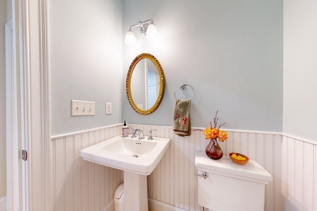 31 Sunset Ridge Lane, Unit 31 Bolton, MA 01740 - Photo 10 of 25 a bathroom with a sink and a mirror