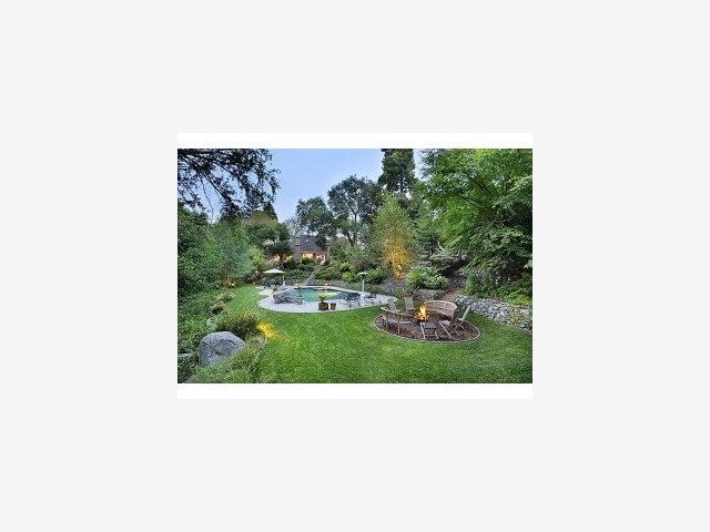 100 Bridge Road Hillsborough, CA 94010 - Photo 9 of 9 a picture of a person on a yard