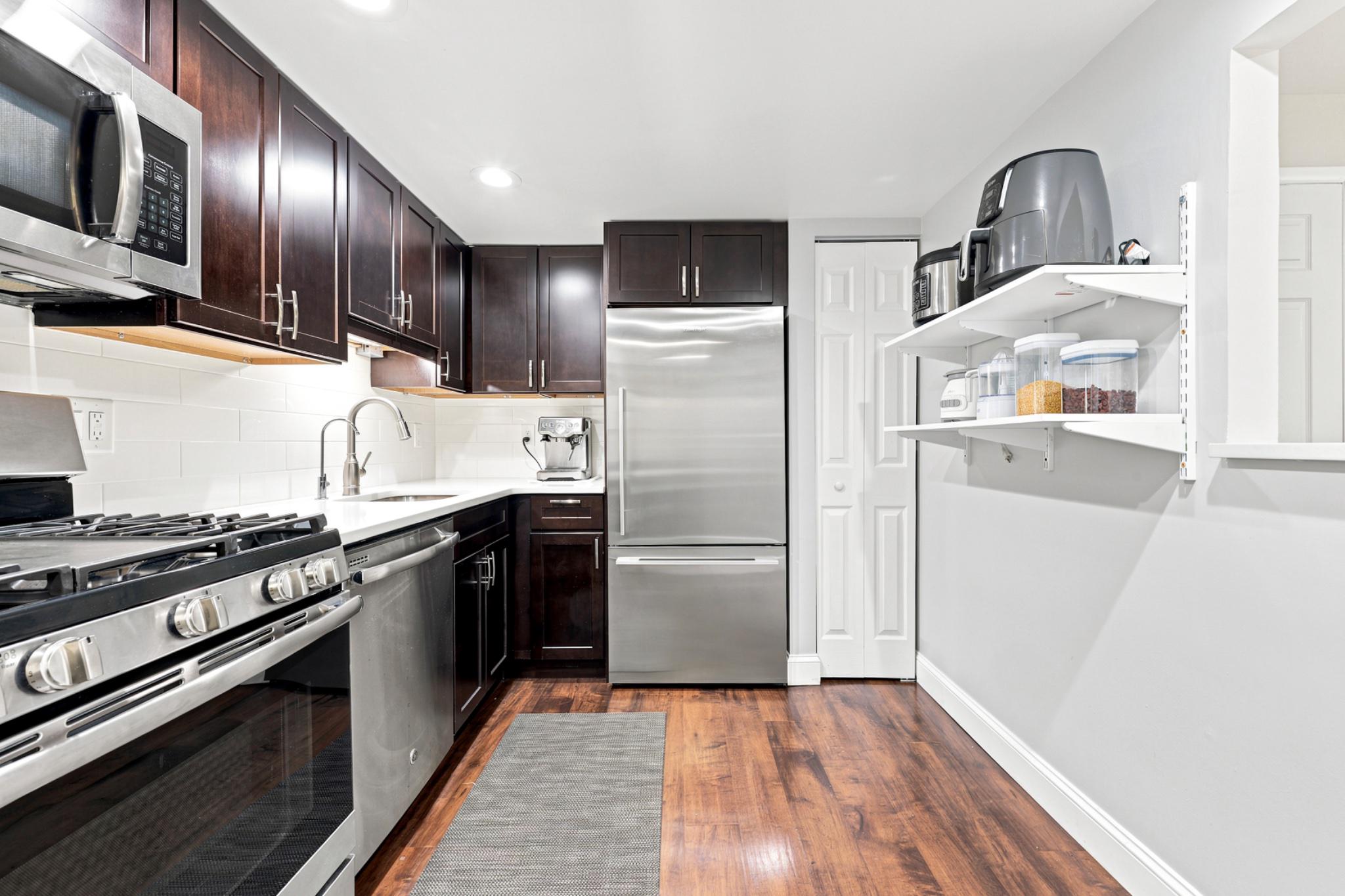 514 Old Forge Crossing Wayne, PA 19087 - Photo 8 of 17 Modern kitchen with sleek finishes.