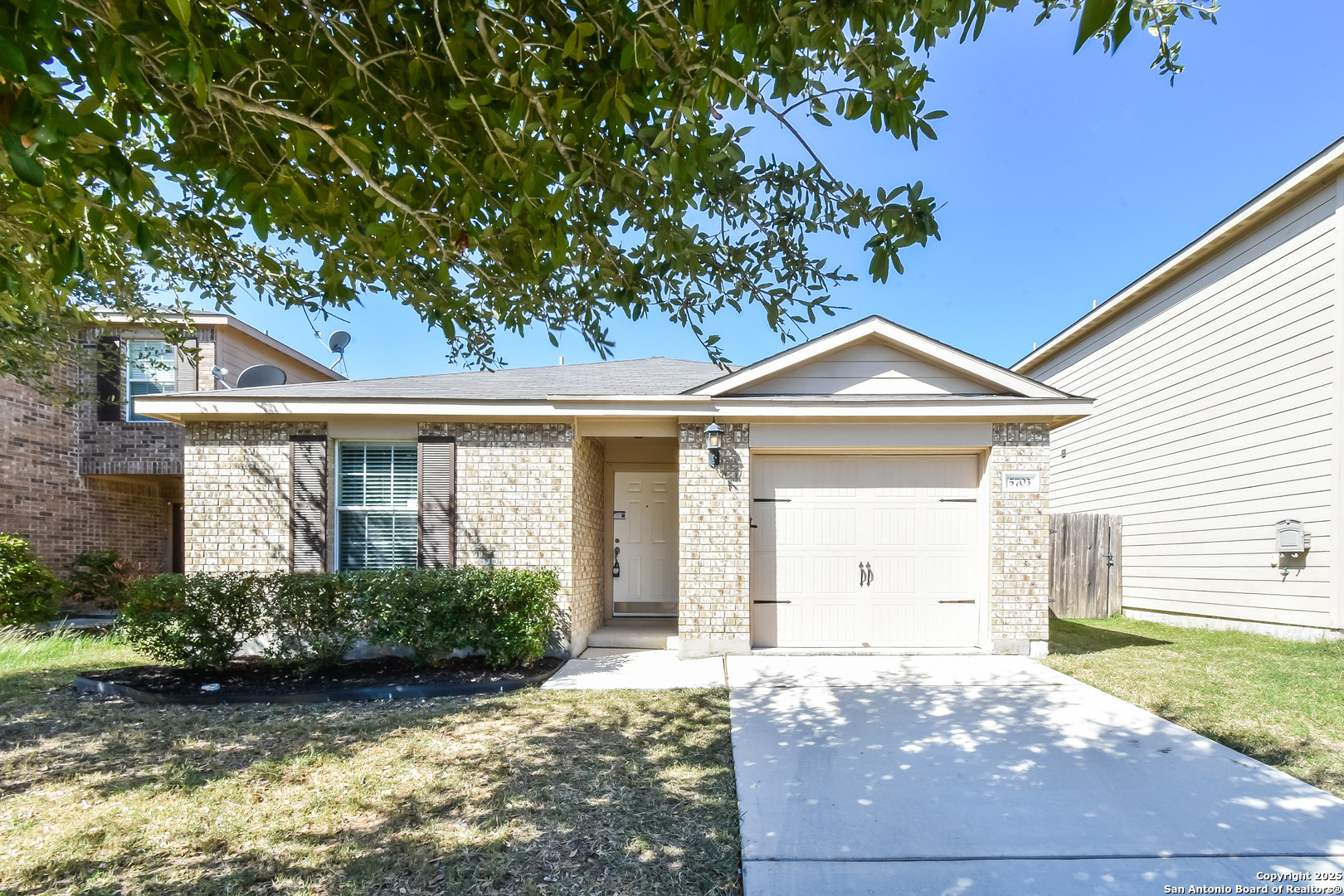 5703 Forest San Antonio, TX 78252 - Photo 1 of 1 a front view of a house with garden