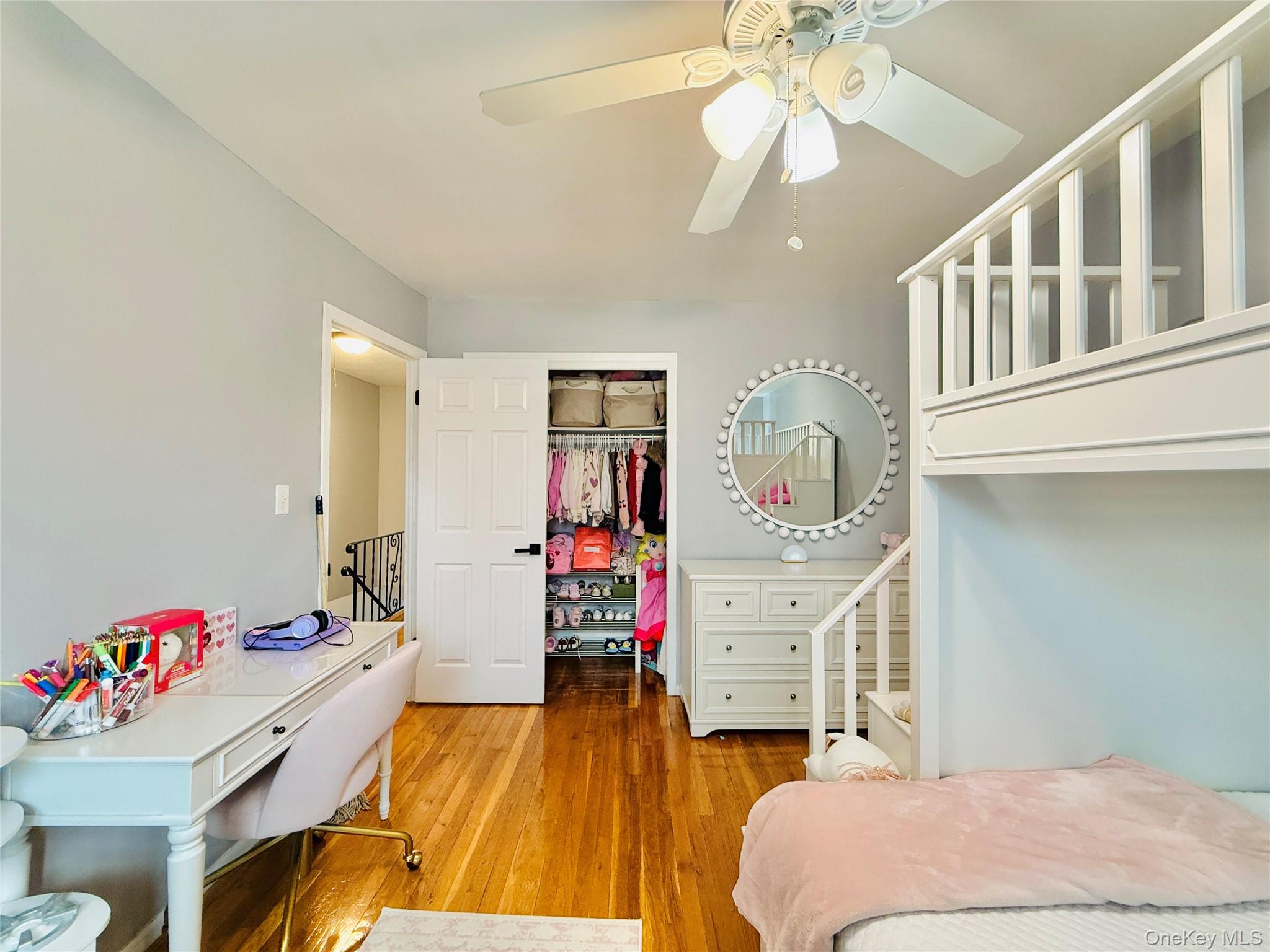 1663 Waring Avenue Bronx, NY 10469 - Photo 18 of 34 a bedroom with a bed and a dresser