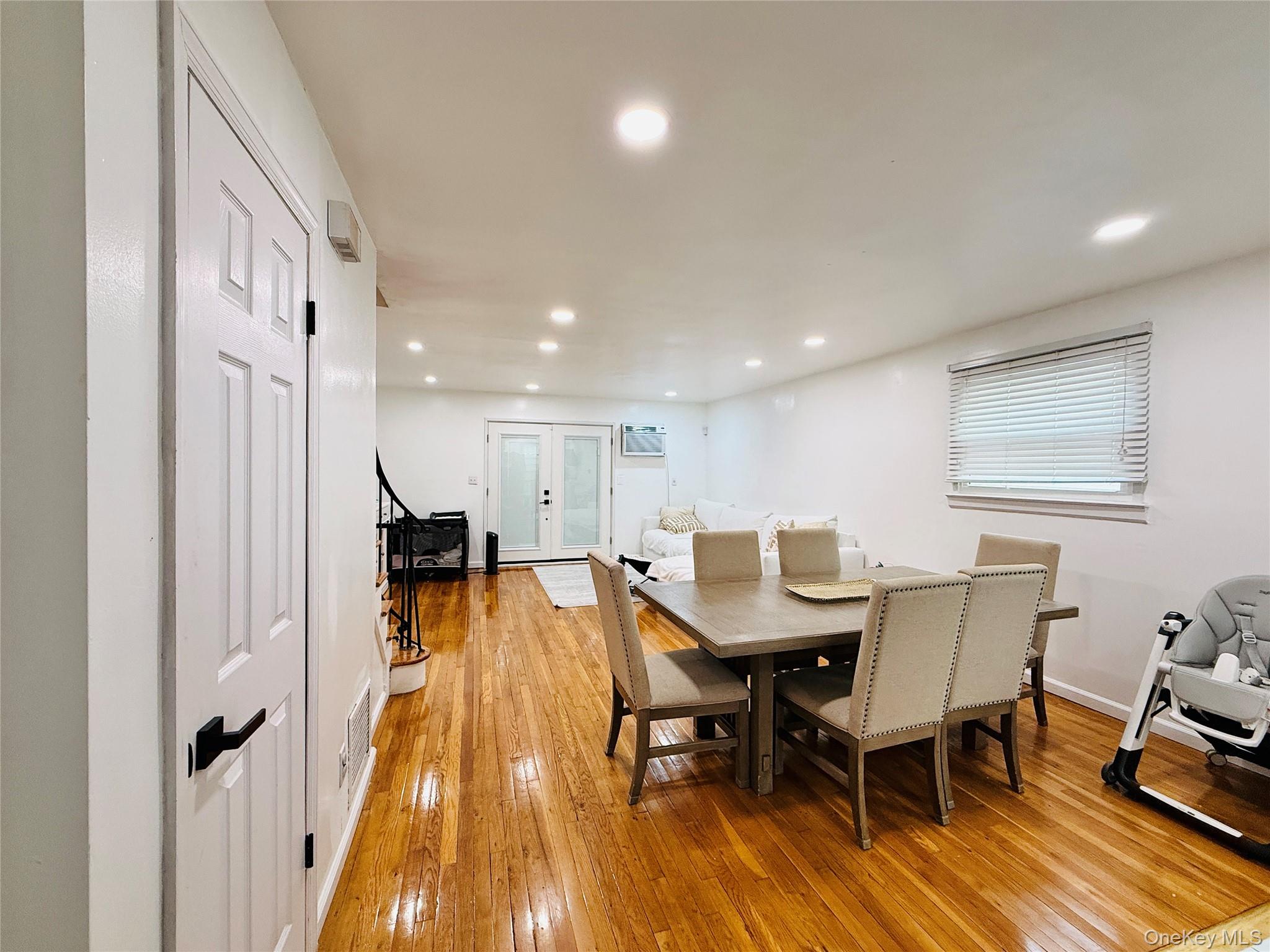 1663 Waring Avenue Bronx, NY 10469 - Photo 6 of 34 a dining room with furniture and wooden floor
