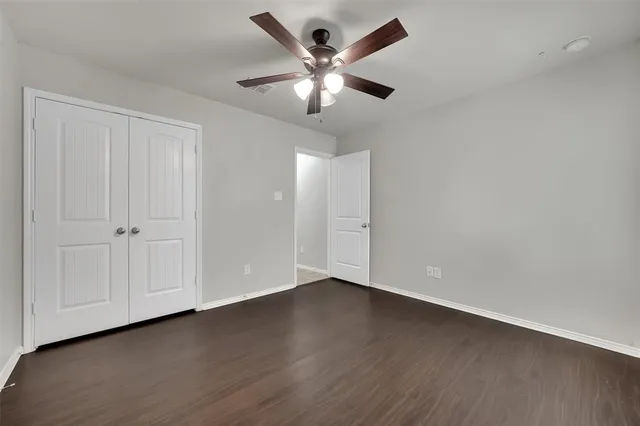a view of an empty walk in closet
