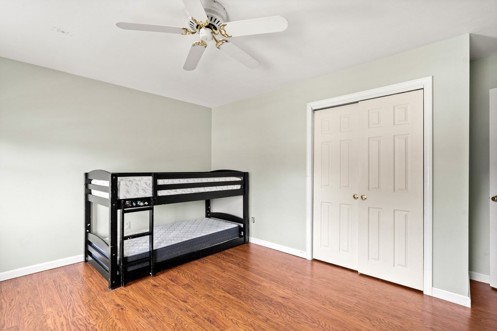 72 Beach Road Salisbury, MA 01952 - Photo 20 of 37 a view of a hallway with wooden floor and staircase