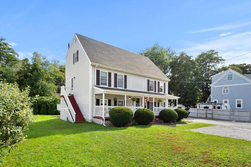 72 Beach Road Salisbury, MA 01952 - Photo 2 of 37 a view of a house with a yard porch and sitting area