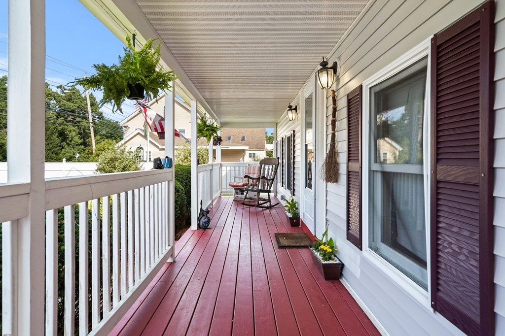 72 Beach Road Salisbury, MA 01952 - Photo 4 of 37 a view of balcony with wooden floor and outdoor space