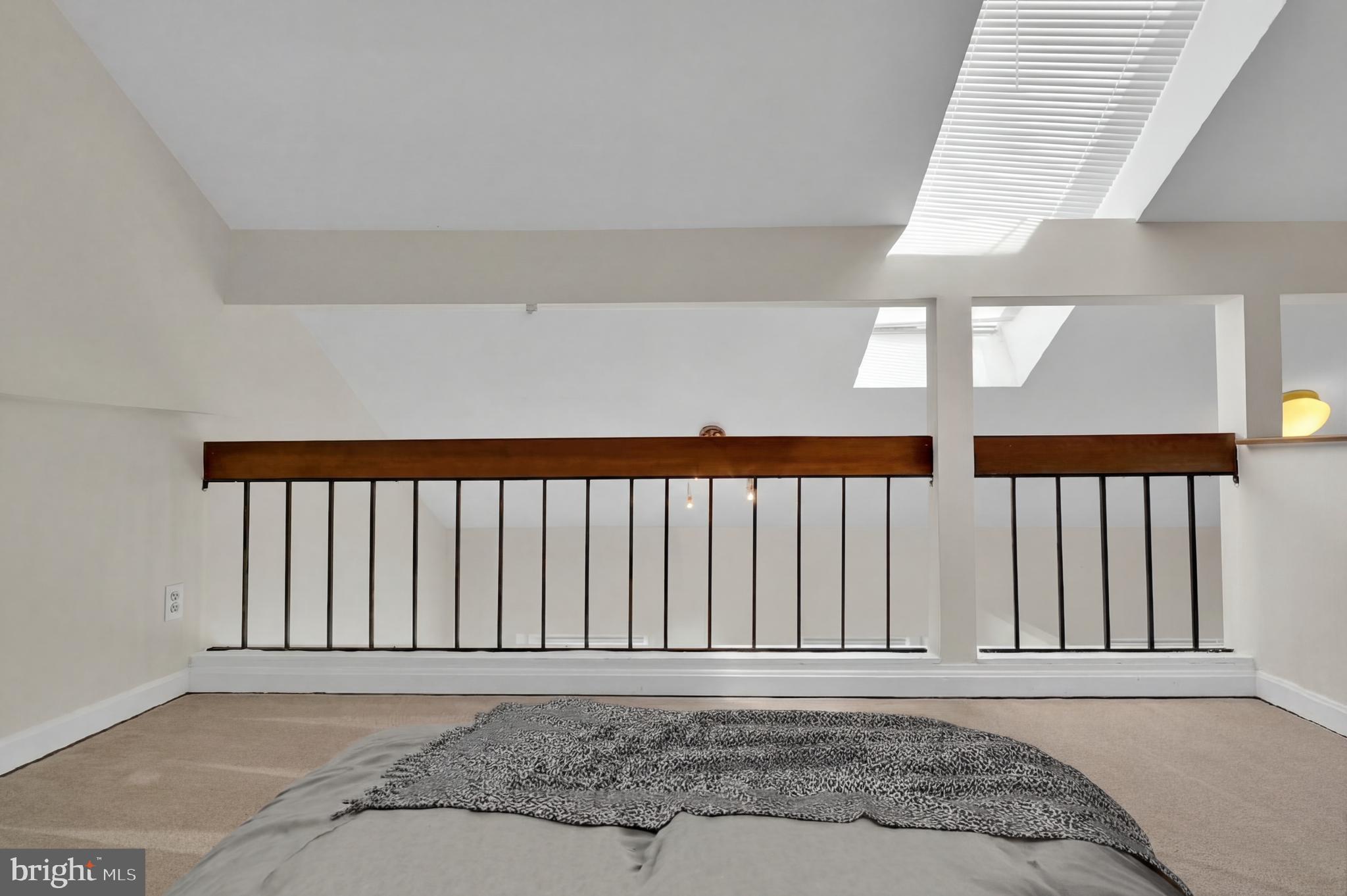3839 Rodman Street Northwest, Unit F36 Washington, DC 20016 - Photo 11 of 35 Staged photo of loft