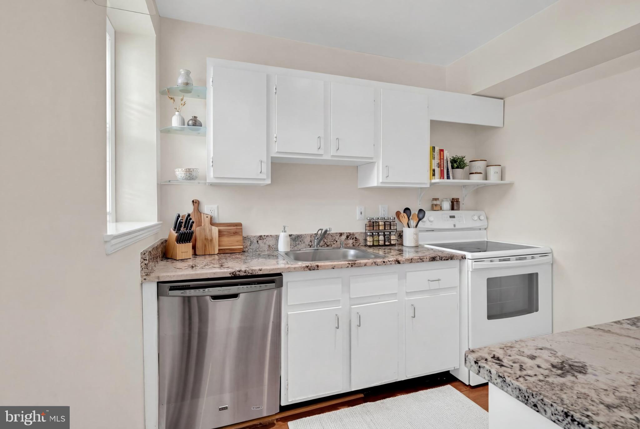 3839 Rodman Street Northwest, Unit F36 Washington, DC 20016 - Photo 17 of 35 staged photo of kitchen
