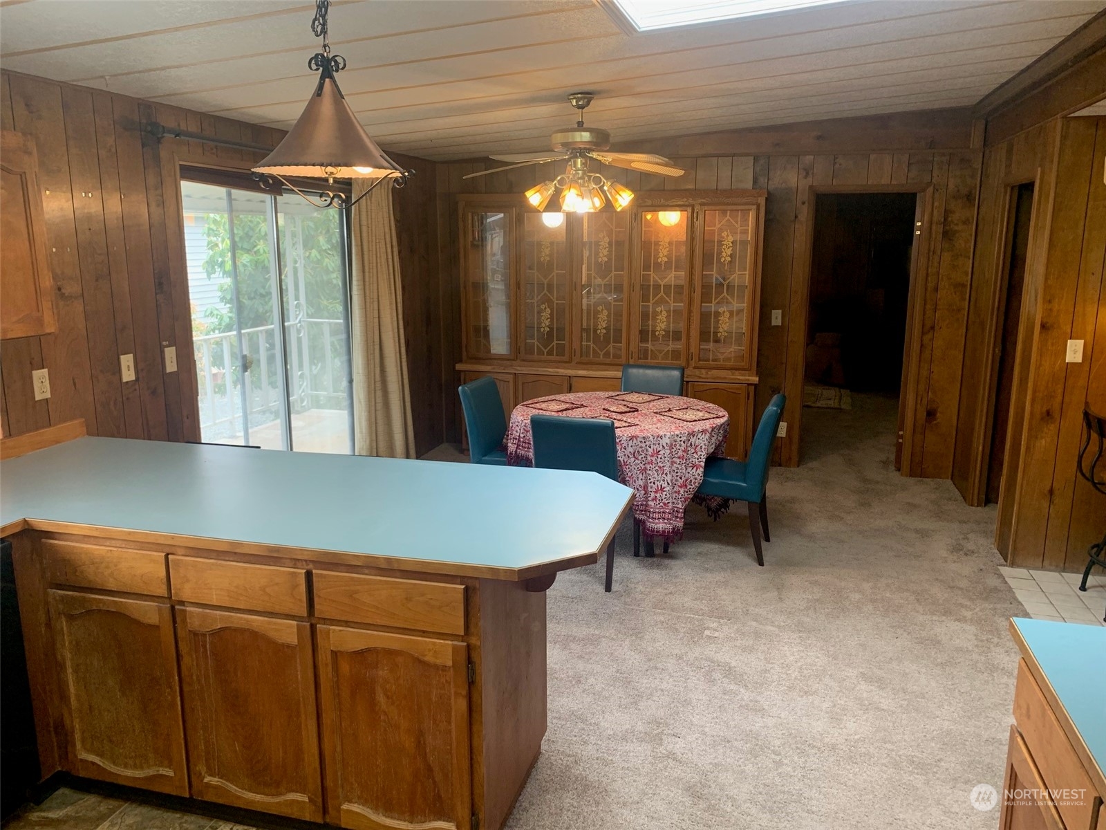 212 Old Owen Road, Unit 65 Sultan, WA 98294 - Photo 7 of 12 a room with furniture a window and chairs