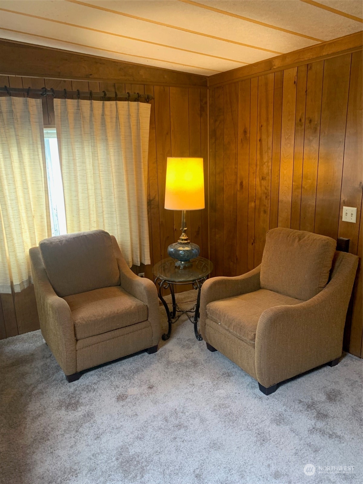 212 Old Owen Road, Unit 65 Sultan, WA 98294 - Photo 8 of 12 a living room with furniture and a window