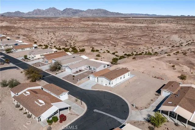 an aerial view of residential building and lake view