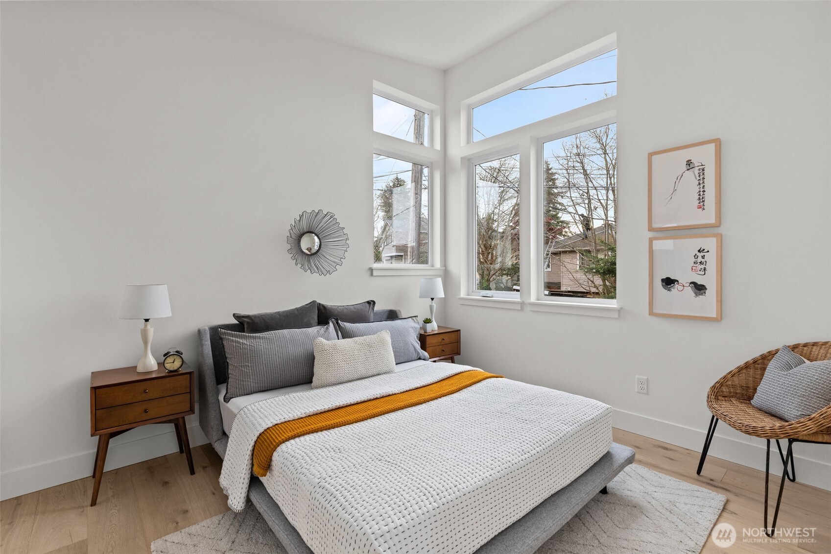 8407 42nd Avenue Southwest Seattle, WA 98136 - Photo 17 of 34 a bedroom with bed and window