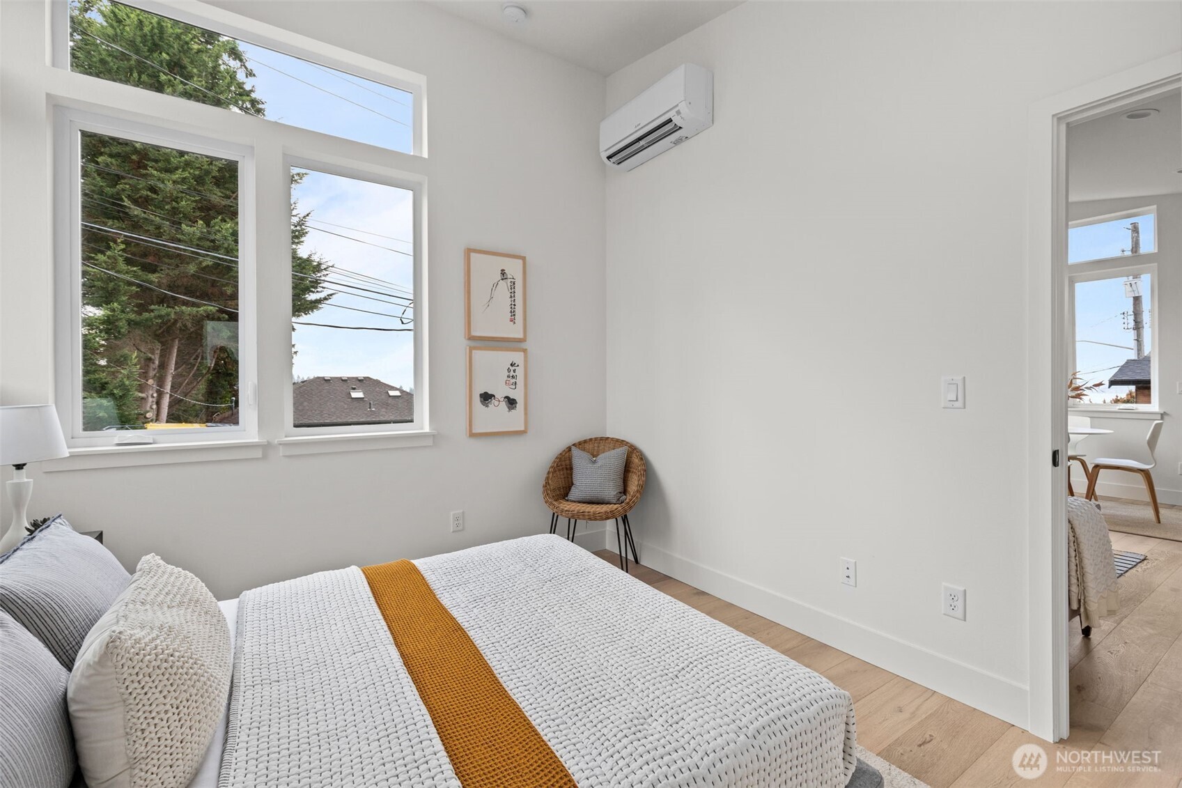 8407 42nd Avenue Southwest Seattle, WA 98136 - Photo 18 of 34 a bedroom with a bed and a window